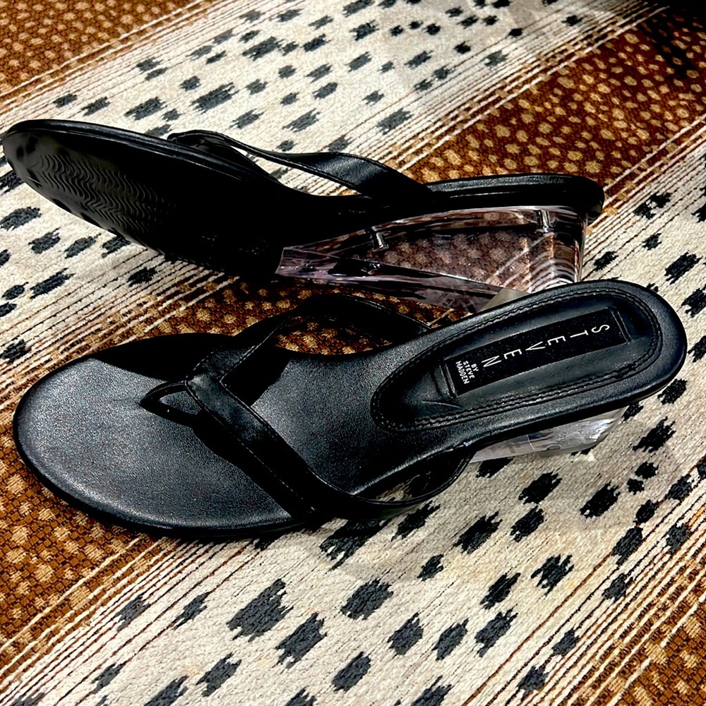Black with Lucite heel thongs by Steven